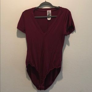 4/$20 🔥 Free People burgundy T-shirt bodysuit